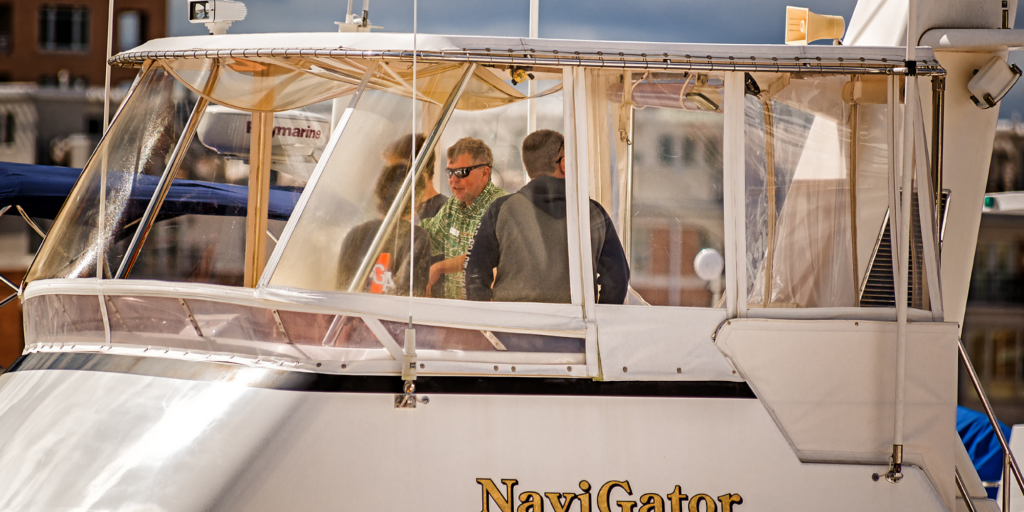 Jeff Merrill and team on a boat